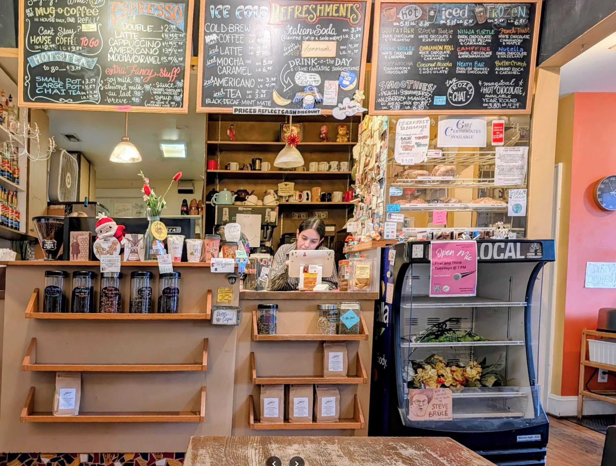 The menu board and ordering counter at Fair Grounds Coffee Cafe